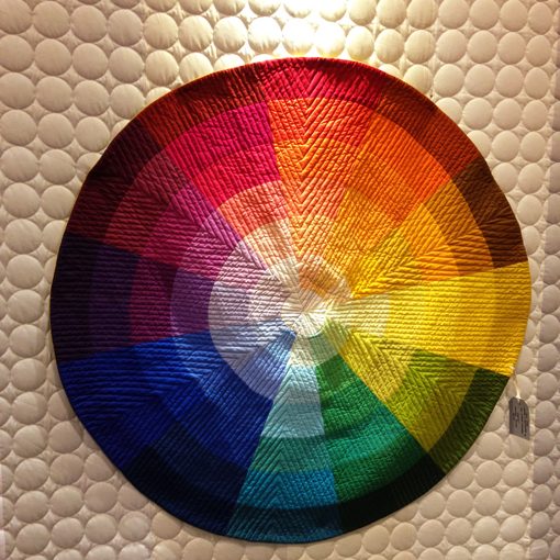 Color Wheel quilt by Kim Eichler-Messmer using Painter's Palette Solids.
