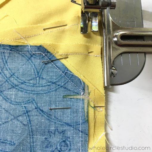 Sewing quilt blocks together using my seam gauge set to a 1/4". This moveable seam gauge makes for the perfect seam allowance!