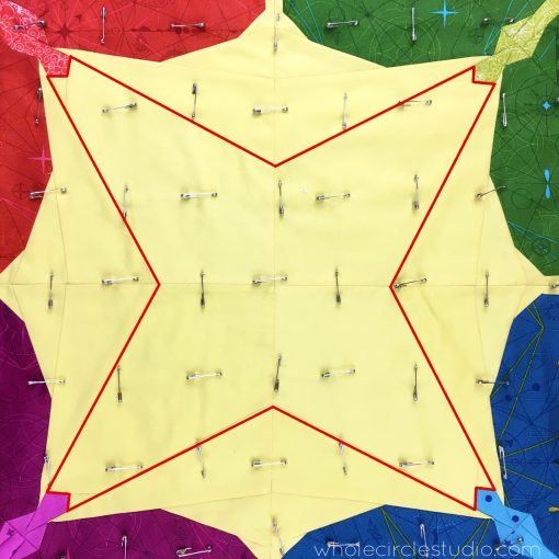 Learn how I plan my quilting designs. Often, I like to follow a prominent seam in my quilt top. This strategy can accentuate the quilt top design making it the star of the show! 