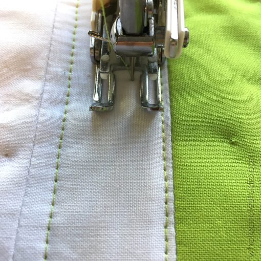 I often use the seams in my quilt top as a guide when quilting with my walking foot. I then use those quilted lines as a guide. 