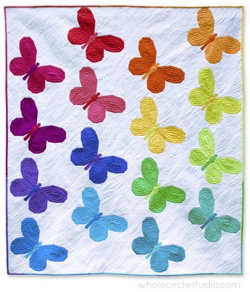 A modern, rainbow version of Butterfly Bunch quilt. Fabric: RJR Cotton Supreme Solids. Pieced and quilted with Aurifil 50 wt. cotton thread. 