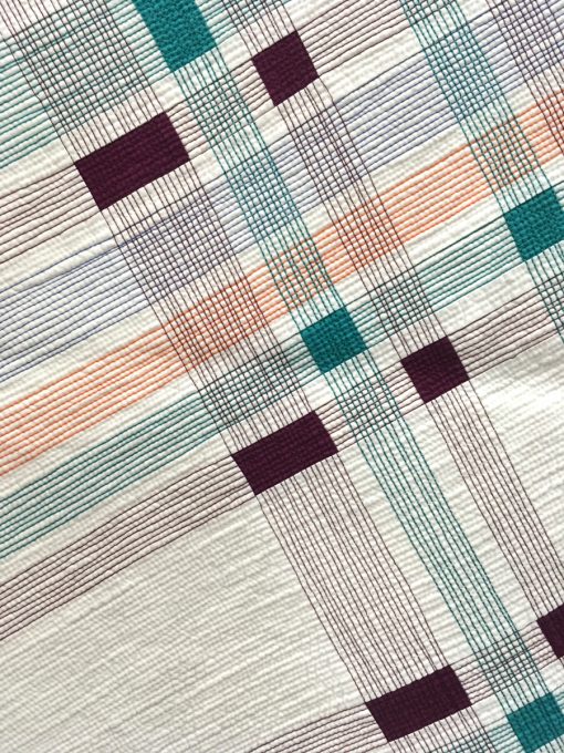 detail of "Pivoted Plaid" by Cassandra I. Beaver. Modern Use of Negative Space quilt