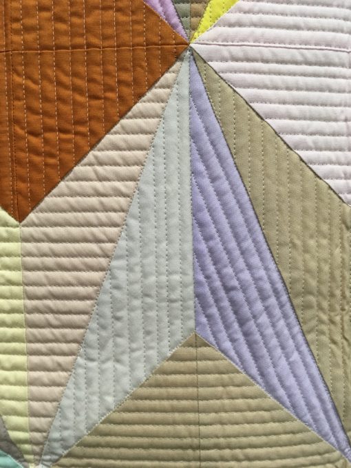detail of "Aura" by Nydia S. Kehnle. Quilted by Gina Pina. Category: Piecing Modern Quilt