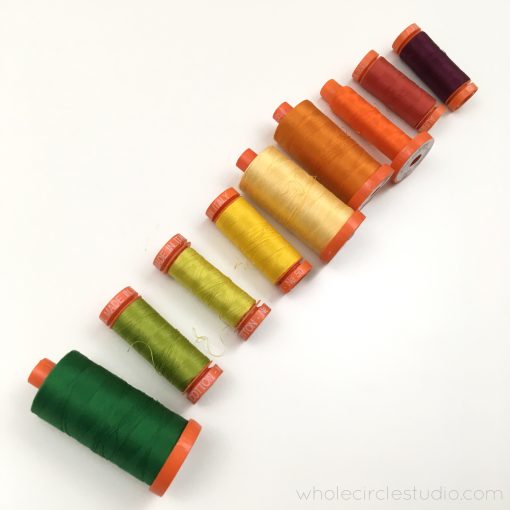 A beautiful selection of fall-inspired cotton thread by Aurifil. Curated by Sheri Cifaldi-Morrill of Whole Circle Studio for the Leaf Peepers quilt.