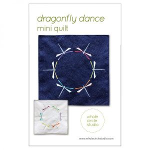 Dragonfly Dance is a graphic wallhanging / mini quilt that uses foundation paper piecing techniques. Make additional blocks to make a larger quilt (layout ideas are provided to make a lap, twin or queen quilt). This tested pattern contains both detailed instructions and diagrams, making it easy to piece. Pattern by Whole Circle Studio.