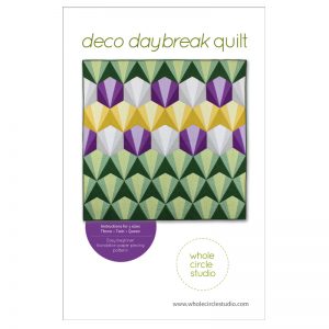 Deco Daybreak is an easy, beginner-friendly foundation paper piecing pattern. The design incorporates the repeat of a foundation paper-pieced block. Use my color selections as inspiration or customize the pattern using the supplied coloring sheet. Instructions are provided for four sizes: Throw, Twin and Queen. Pattern by Whole Circle Studio.