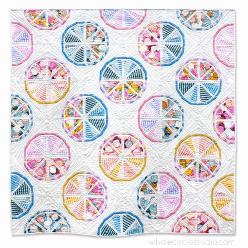 Citrus Slices, a fun modern foundation paper piecing quilt pattern. Designed by Sheri Cifaldi-Morrill of Whole Circle Studio