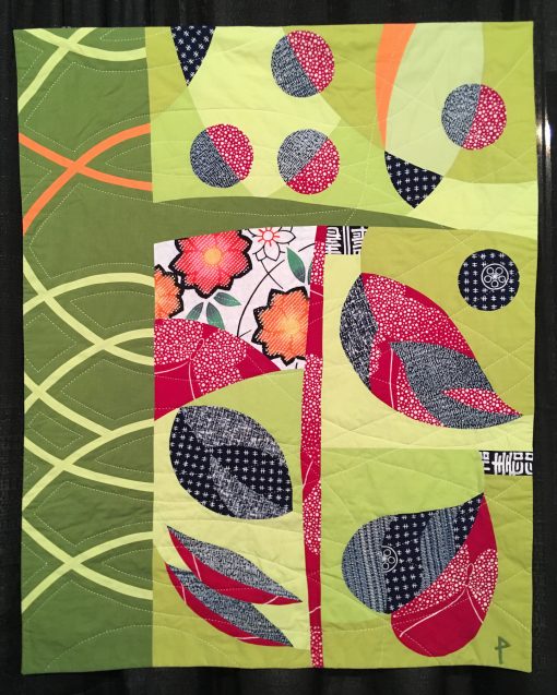 "Leaf & Berry" by Patricia Belyea <br>Statement: "The quilt design was created with five unrelated and lyrical quilt blocks where I played with color and design. The first block was the heart-shaped leaf on the bottom right. From there, I responded to the existing shapes and colors to make the next block. The dashed quilting was stitched with a Sashiko 2 machine." [Design Source: This was inspired by nature and an interest in exploring complex curved piecing. | Techniques: Machine pieced and quilted] 