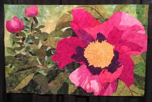 "Firelight Peony" by Barbara Persing <br>Statement: "This quilt is based on a photo I took at the Denver Botanical Gardens. The construction of this quilt is done with glue-basted-raw-edge applique. There is no fusible web in this quilt. All of the thread work was done with Aurifil 40wt and 50wt cotton thread. I used over 56 colors in this quilt." [Design Source: Personal photograph | Techniques: Machine appliqued and quilted] 