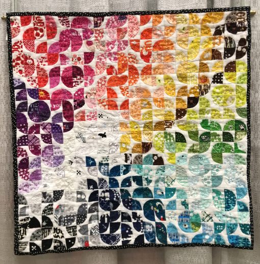 “Curvelets” by Jen Carlton Bailly @bettycrockerass Statement: “Teeny tiny bits Focuse order and routine Present mind calming” Modern quilt featured in the Small Quilts category at QuiltCon 2020 in Austin, Texas presented by the Modern Quilt Guild.