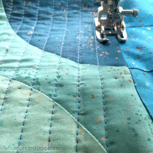 Quilting with the EvenFeed foot on a Janome 6700p on my Big Island Sky throw quilt. 