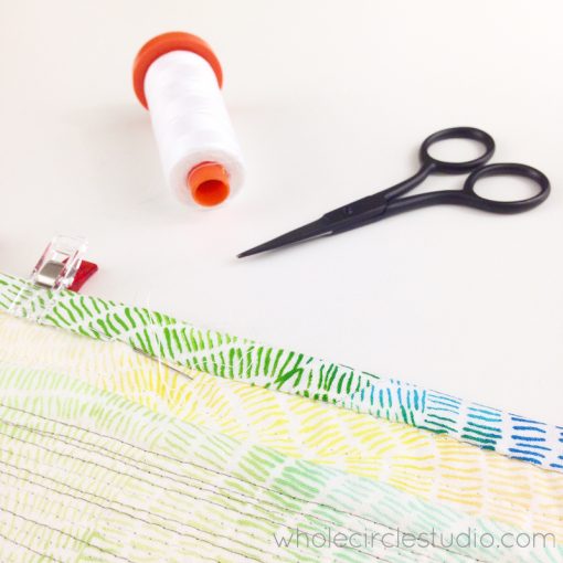 Scrappy binding using Ombre Stitches by Quilting Treasures. 