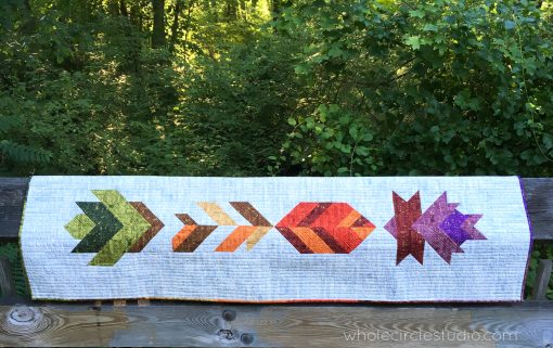 Leaf Peepers quilt blocks. Easy to piece half square triangle blocks. Make a mini quilt, table runner, wall hanging, twin quilt or queen quilt. Quilt Along with Leah Day and Whole Circle Studio.