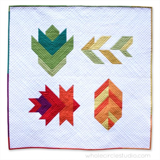 Leaf Peepers quilt blocks. Easy to piece half square triangle blocks. Make a mini quilt, table runner, wall hanging, twin quilt or queen quilt. Quilt Along with Leah Day and Whole Circle Studio.