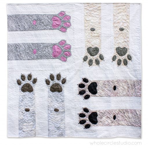 Paws Up! an intermediate foundation paper pieced quilt pattern celebrating dogs and cats. Pattern makes 4 sizes—Mini, Throw, Twin and Queen. Pattern available at www.wholecirclestudio.com