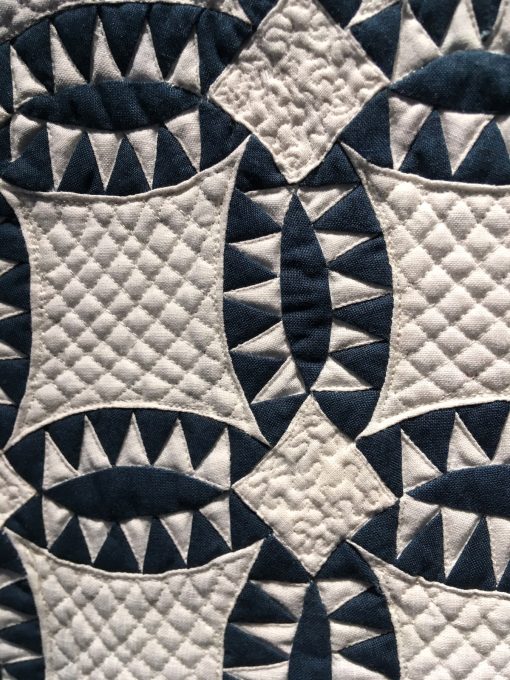 detail of Pickle Dish by Andrea Blackhurst. Techniques: Machine pieced and quilted. Design Source: Miniature Quilts Magazine #35. Photo taken at 2019 International Quilt Festival