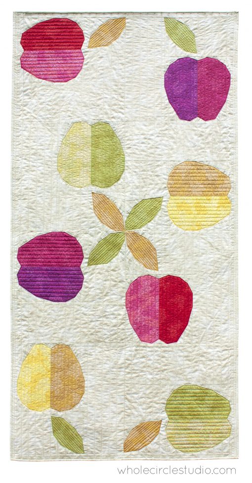 Apple Turnover, a fun modern foundation paper piecing quilt pattern. Designed by Sheri Cifaldi-Morrill of Whole Circle Studio