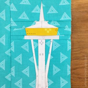 Space Needle (Seattle, Washington) quilt block made with Art Gallery Fabrics Elements. Foundation paper piecing pattern, part of Around the World Block of the Month Quilt Sew Along