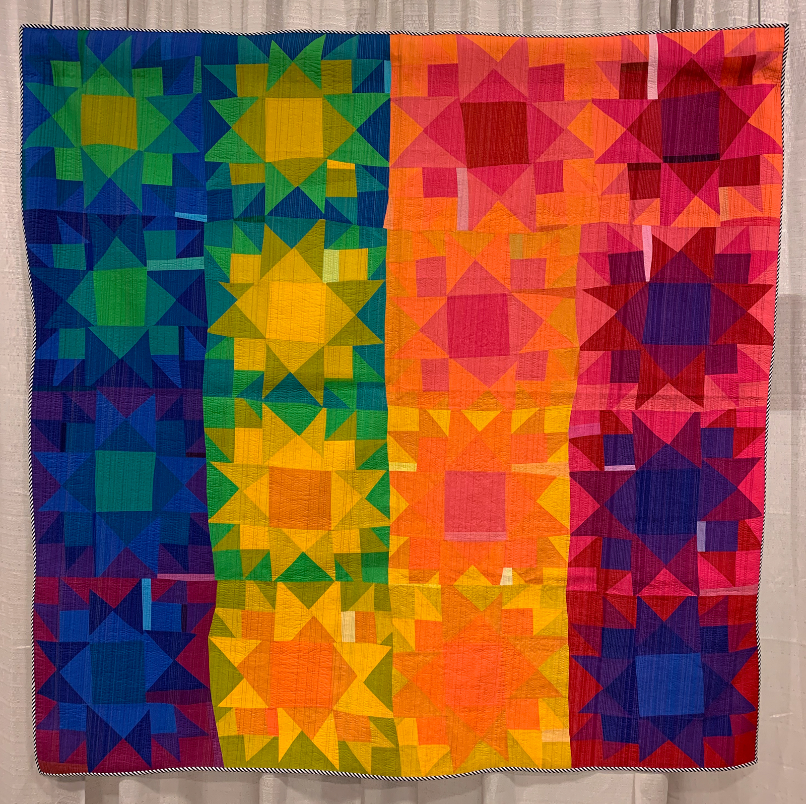 Colorful modern quilt with 16 wonky stars. 