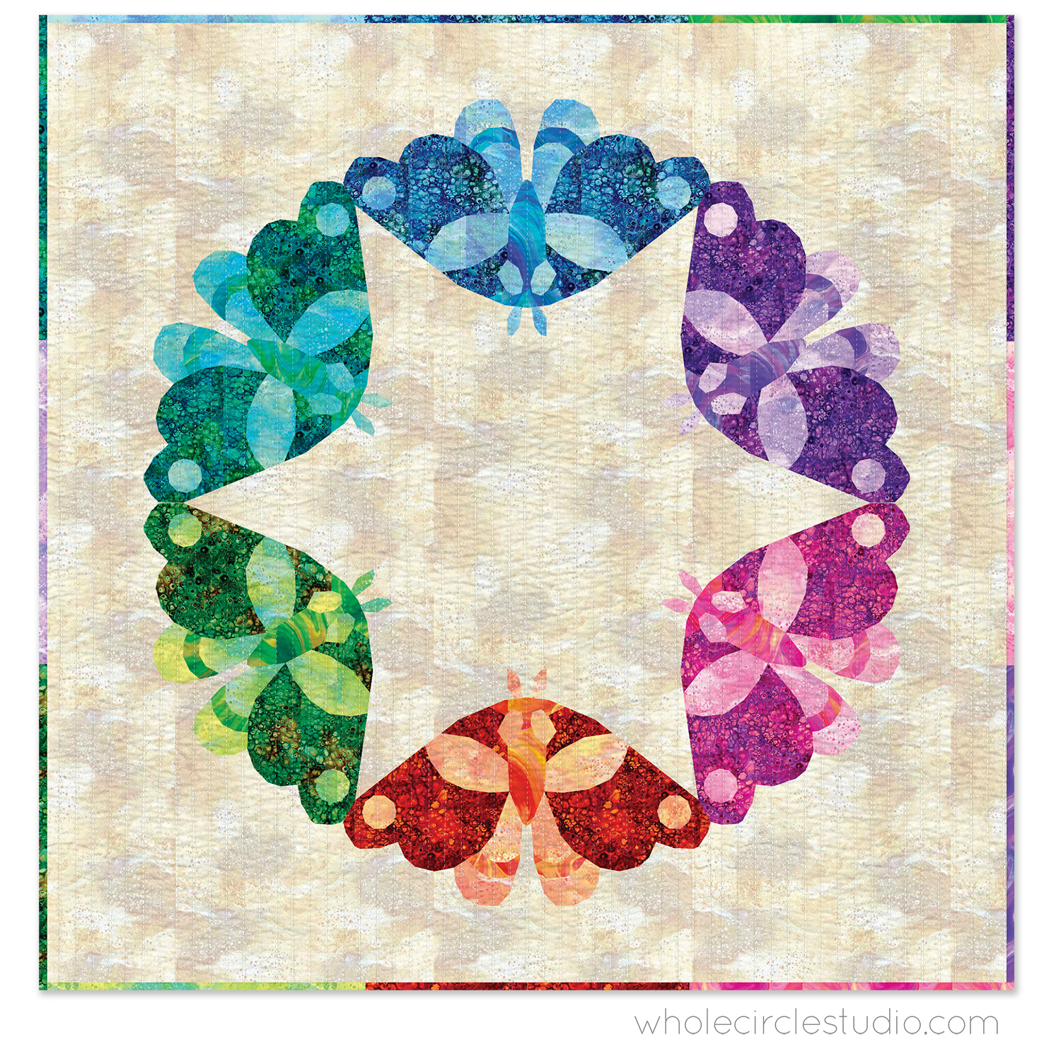 quilt with 6 colorful moths in a circle