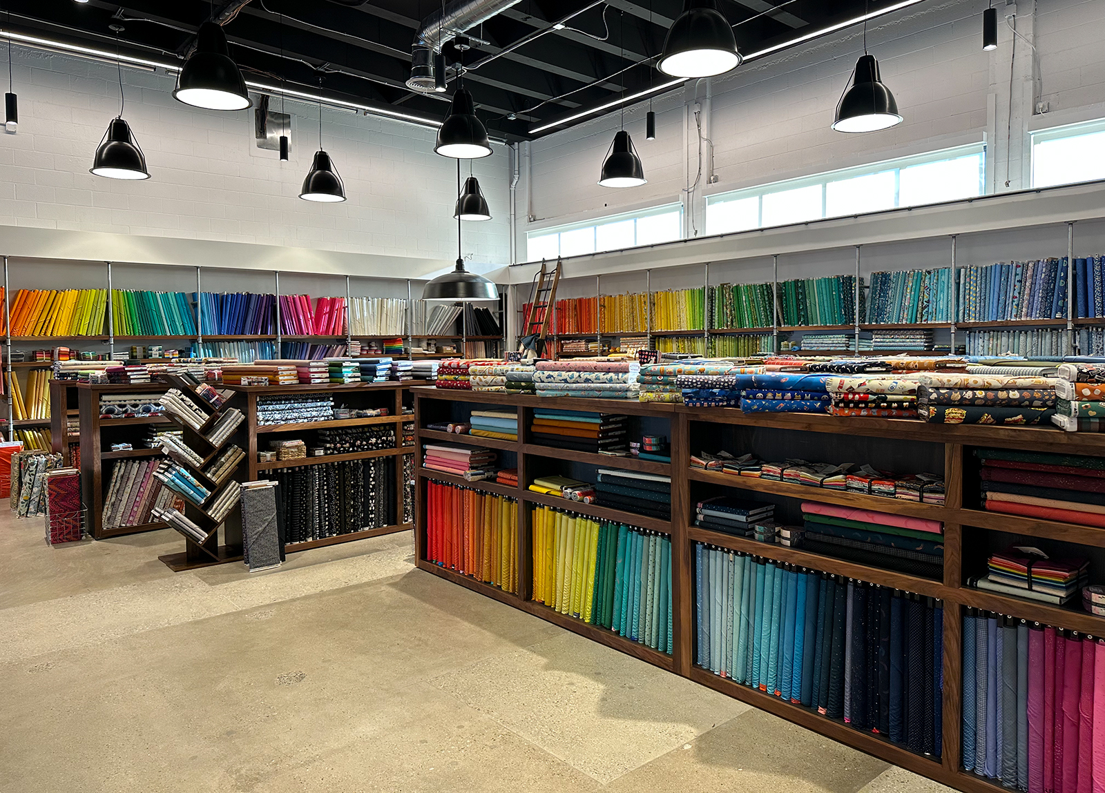 interior of a fabric store with colorful fabric