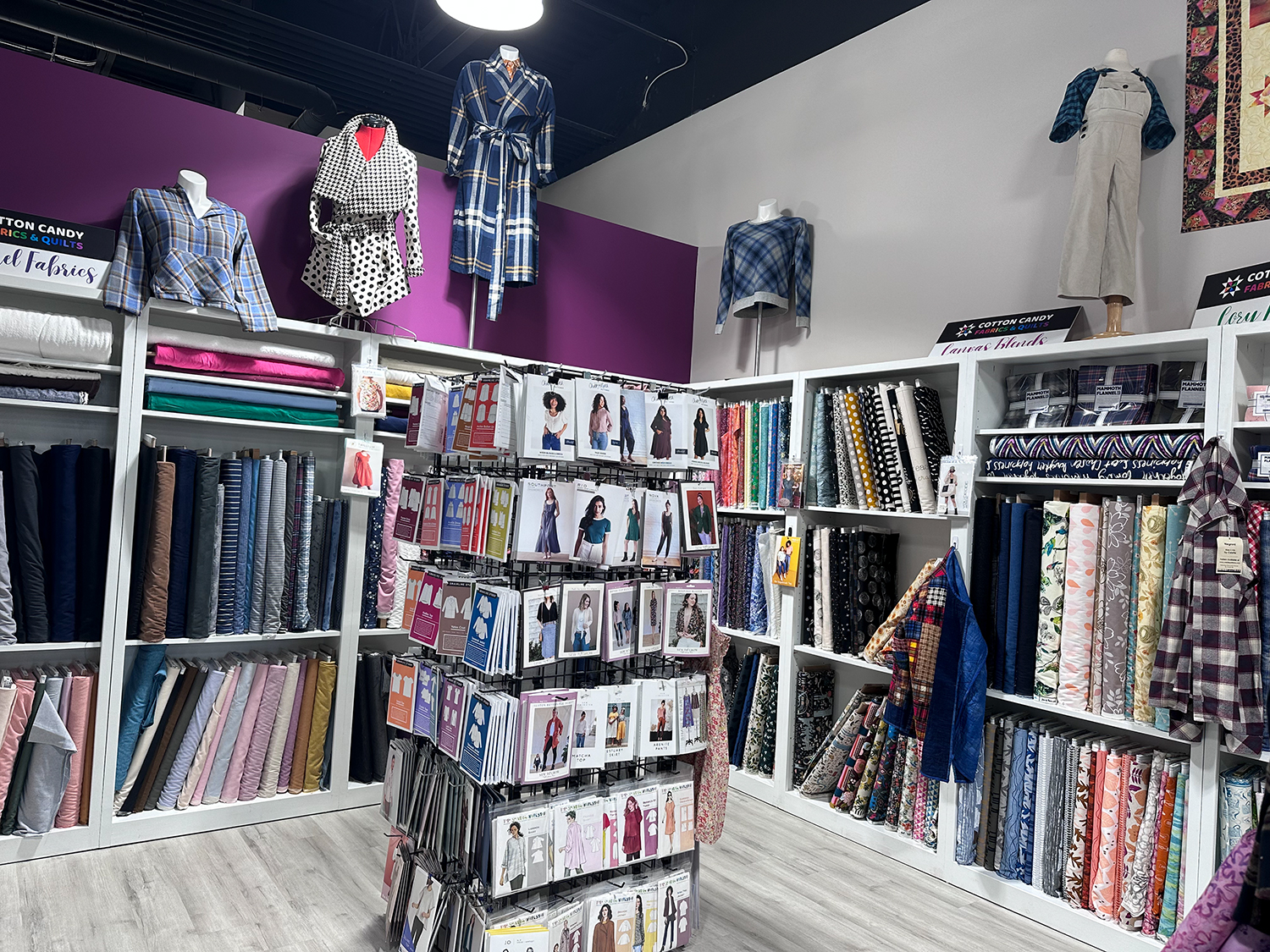 interior of a fabric store with apparel patterns and fabric