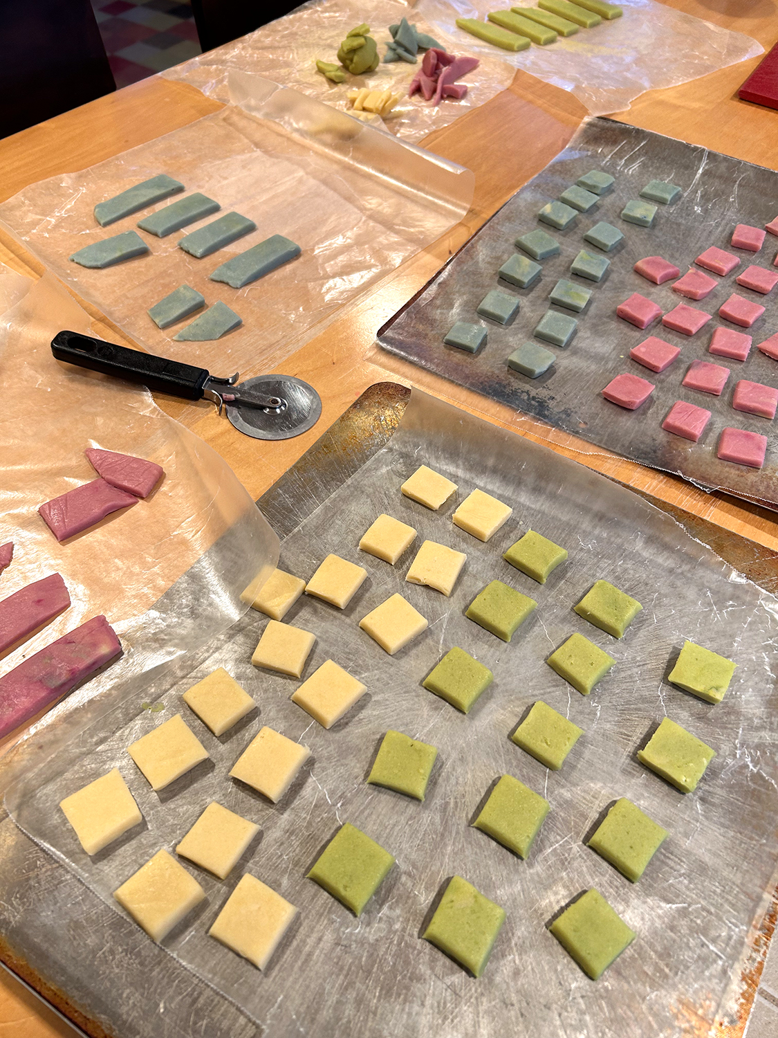 square shapes of colorful cookie dough