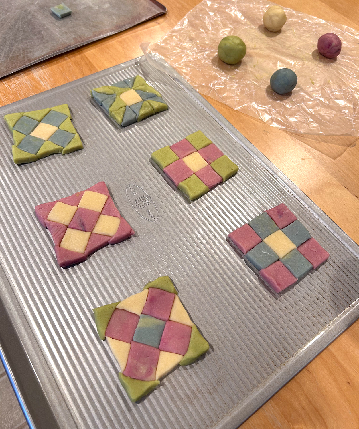 colorful uncooked cookie dough that looks like quilt blocks