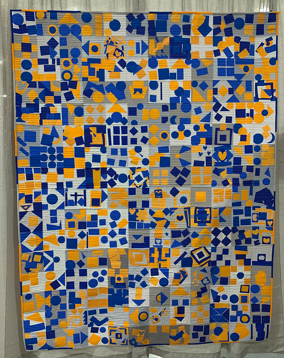 geometric, blue, yellow, and neutral modern quilt