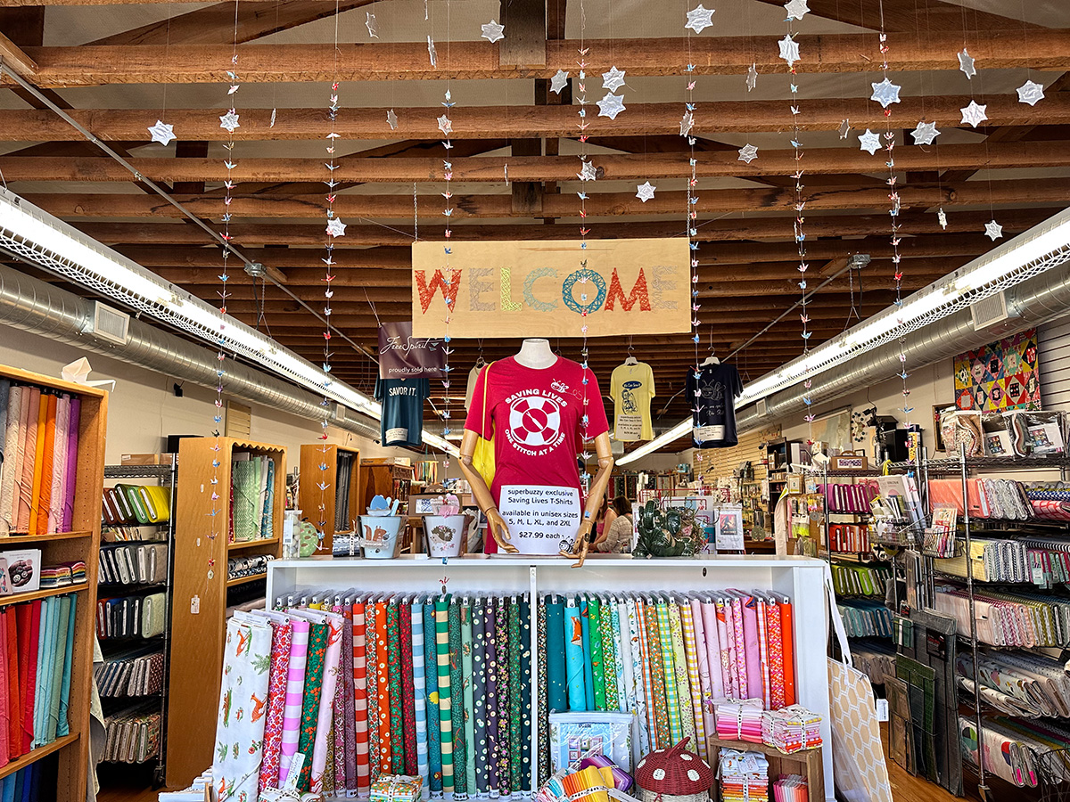 interior of colorful fabric / quilt shop
