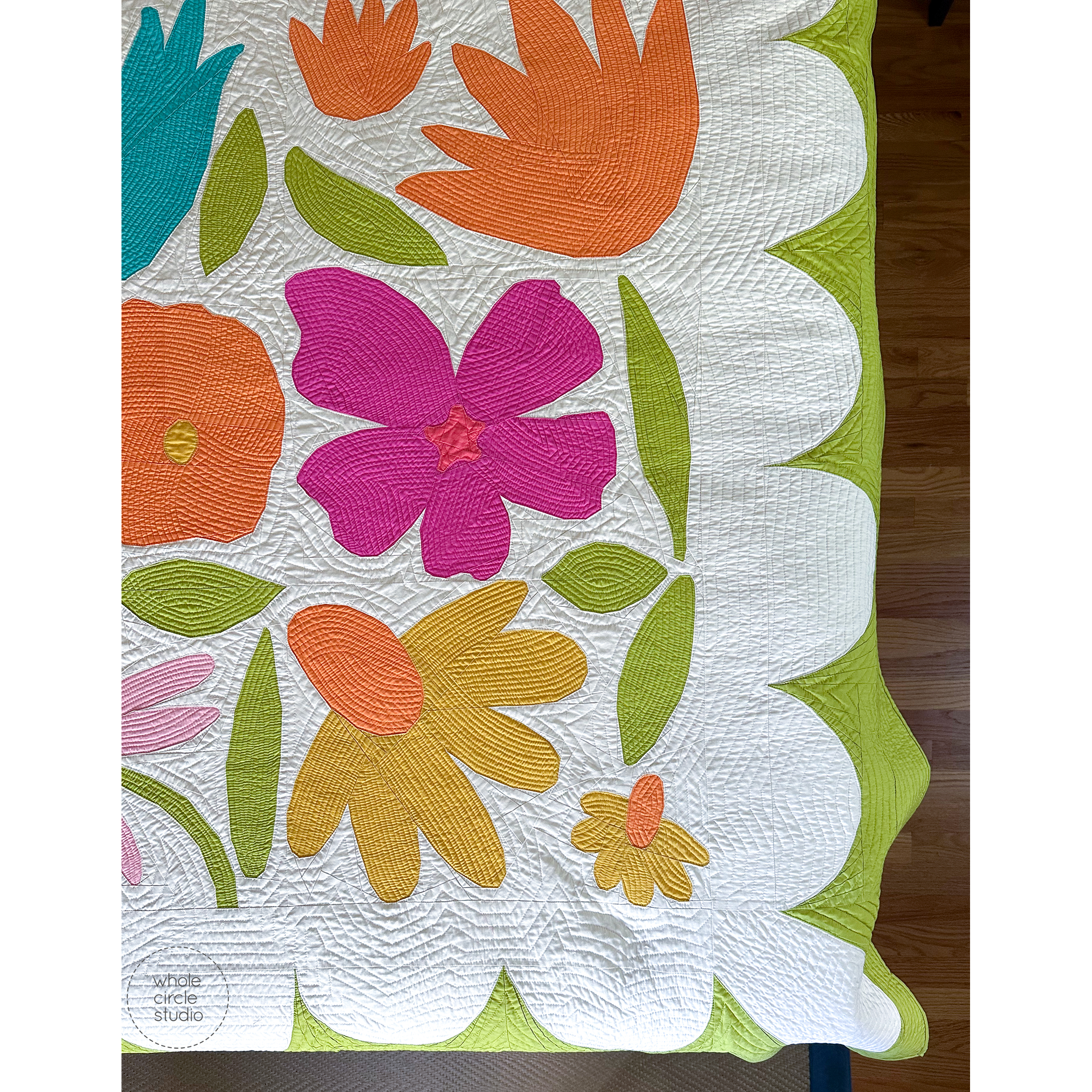 close up of bold, colorful flower quilt