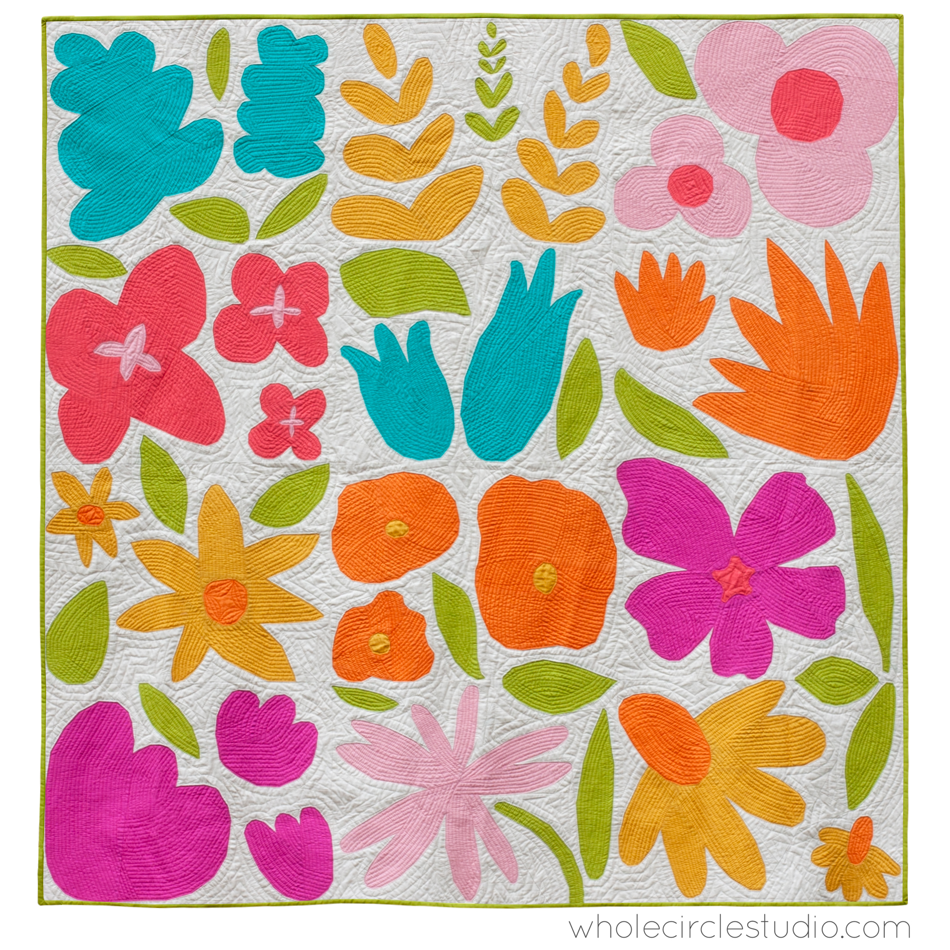 modern flower quilt with bright colors on a cream background