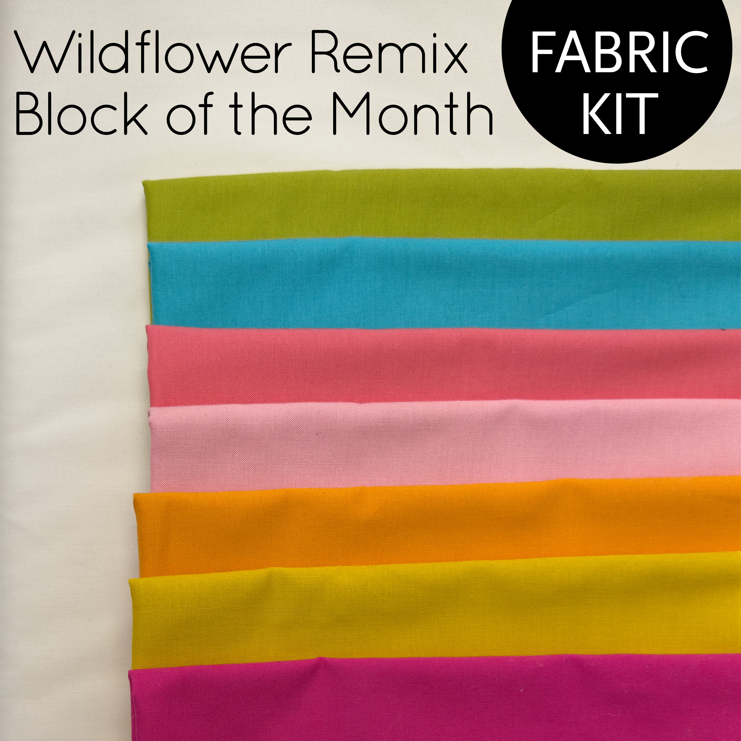 stack of colorful fabric for a quilt kit