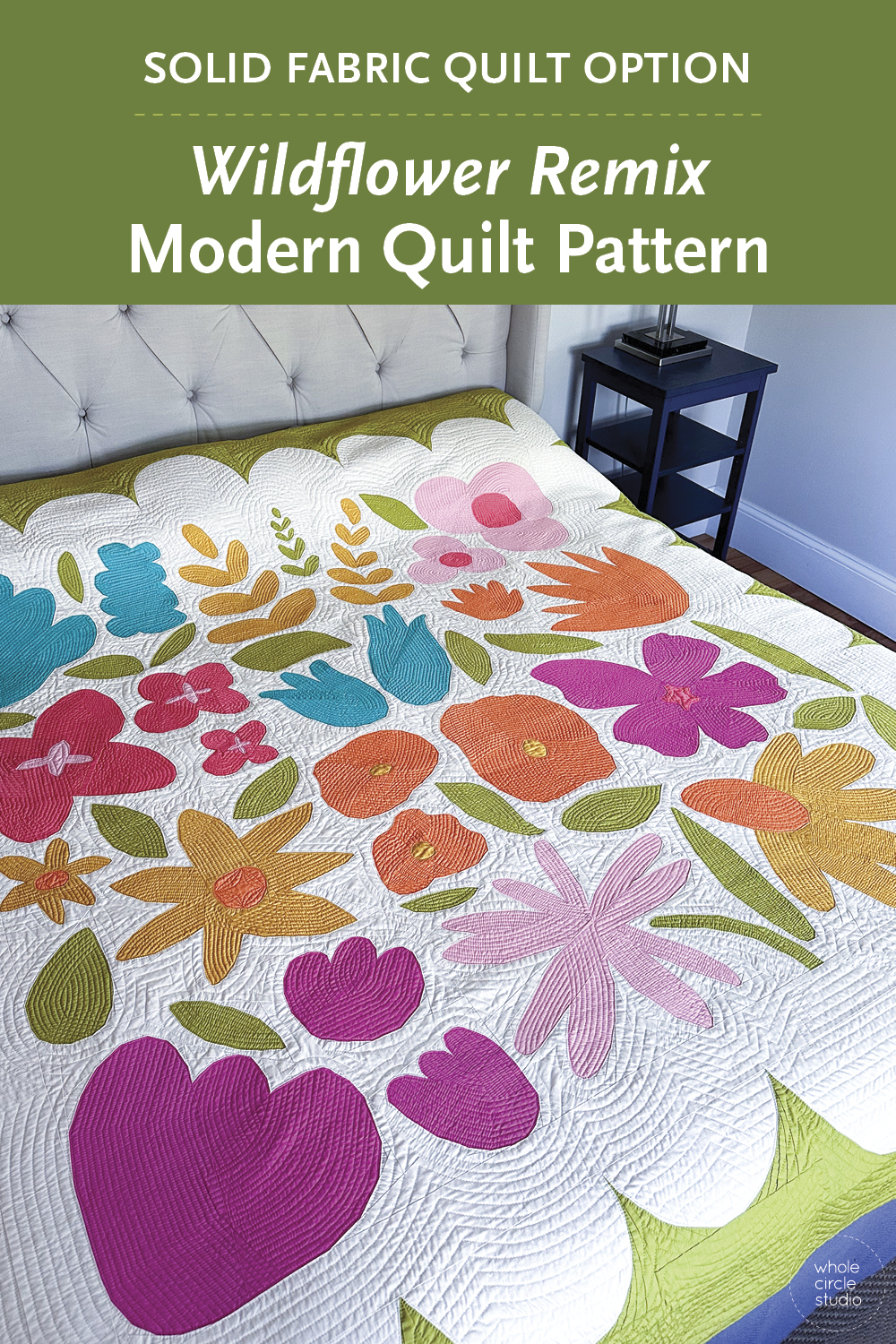 modern flower quilt on a bed
