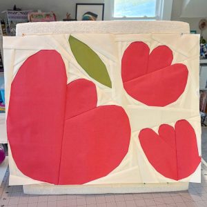 modern flower quilt block in a room