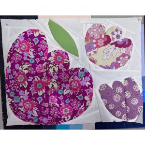 modern quilt block made with bold fabrics