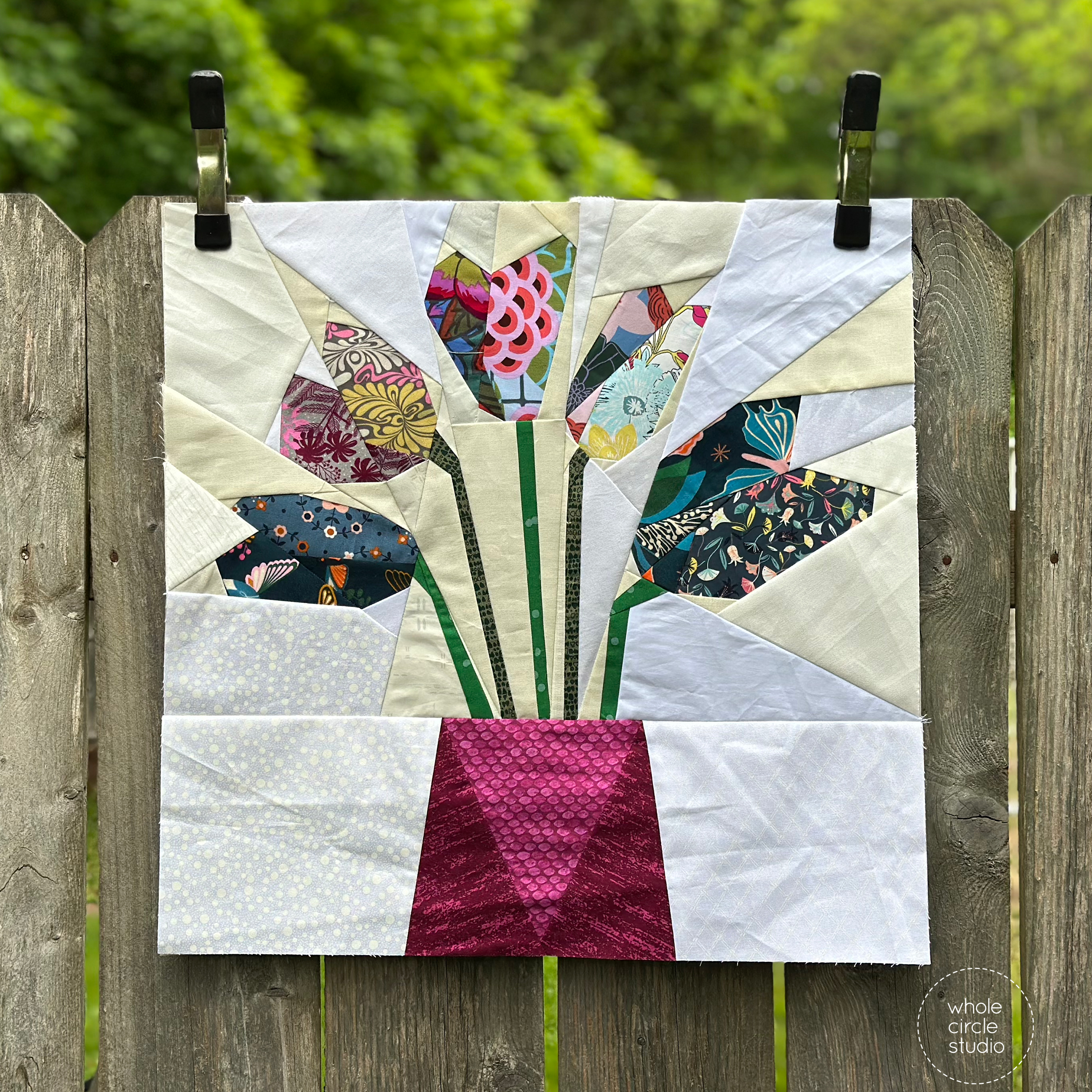 Modern tulip quilt made with floral fabric scraps