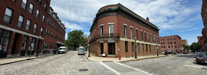 historic brick building and cobblestone streets